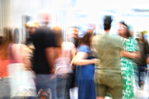 A blurred image of attendees enjoying the culture crawl.